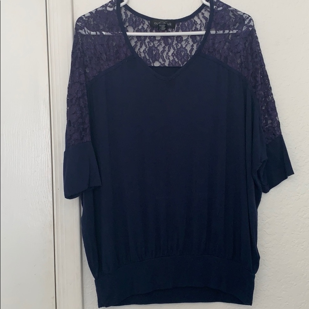 Blue, wing sleeved top with lace shoulders.